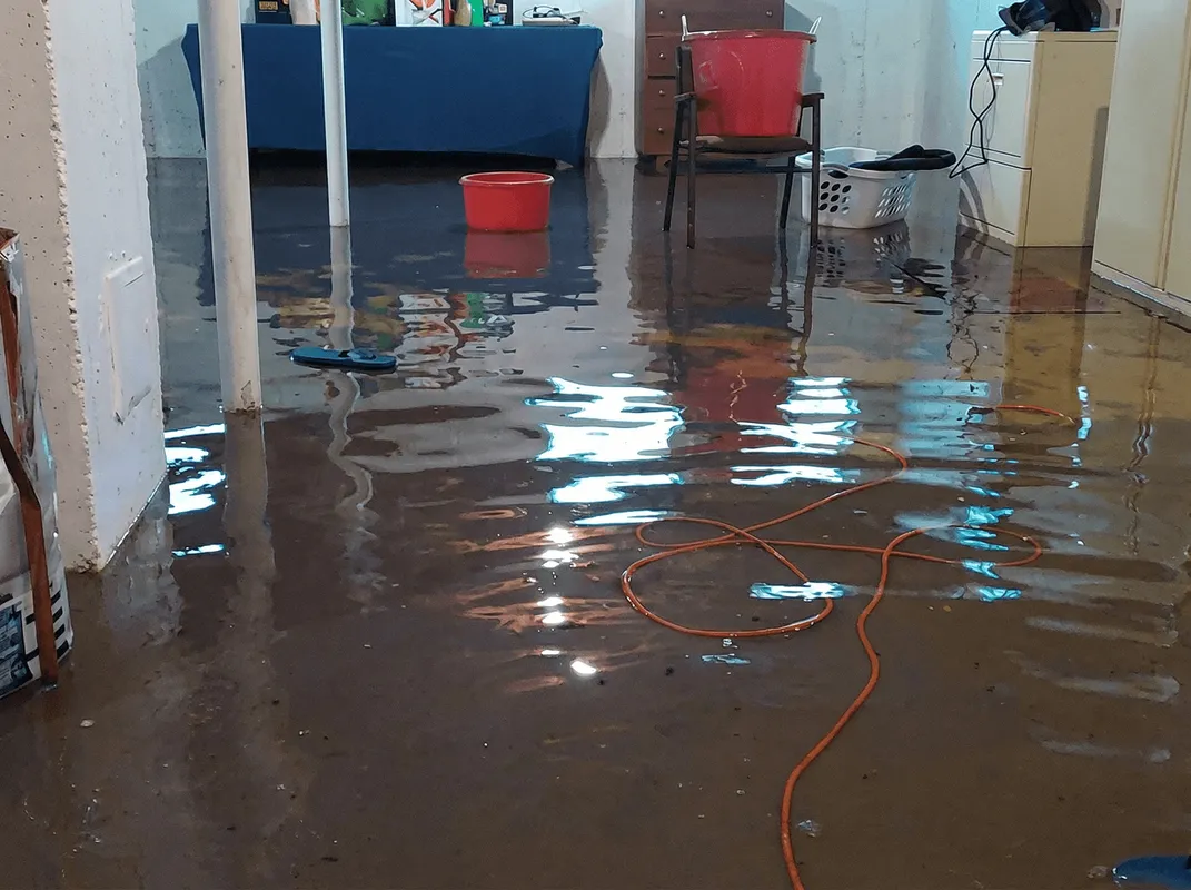Basement with boiler, cabinets and washing machine completely flooded in Dover, DE